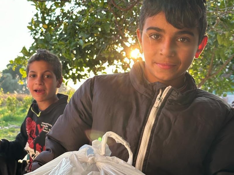 A food recipient in Syria.