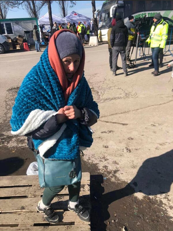 Blanket provided to an elderly woman.